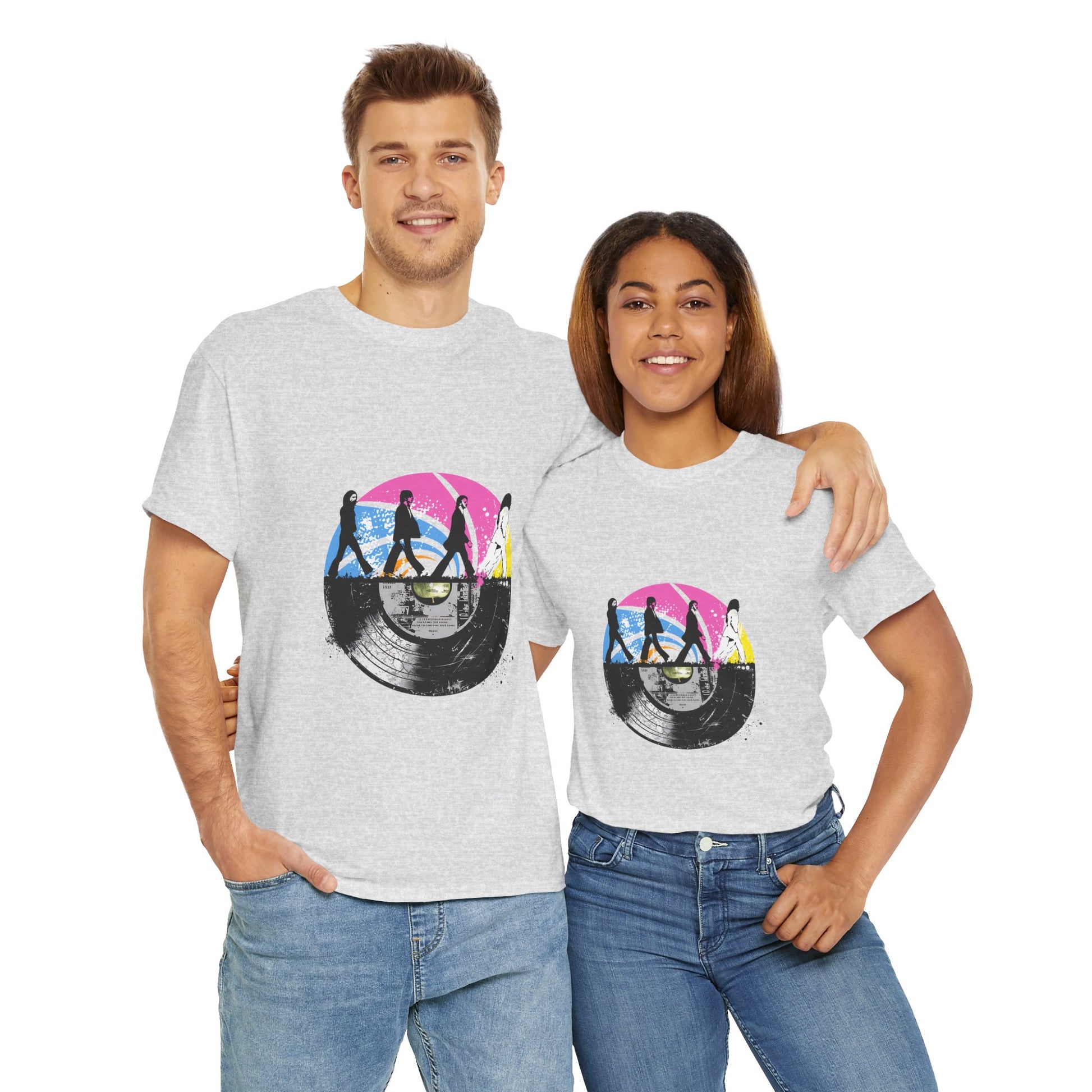 Unisex heavy cotton t-shirt featuring an original Beatles tribute design. This tee blends a classic Abbey Road silhouette with a vibrant vintage vinyl record print, capturing retro rock vibes and timeless nostalgia. Perfect for concerts, casual hangouts, and music-themed events.