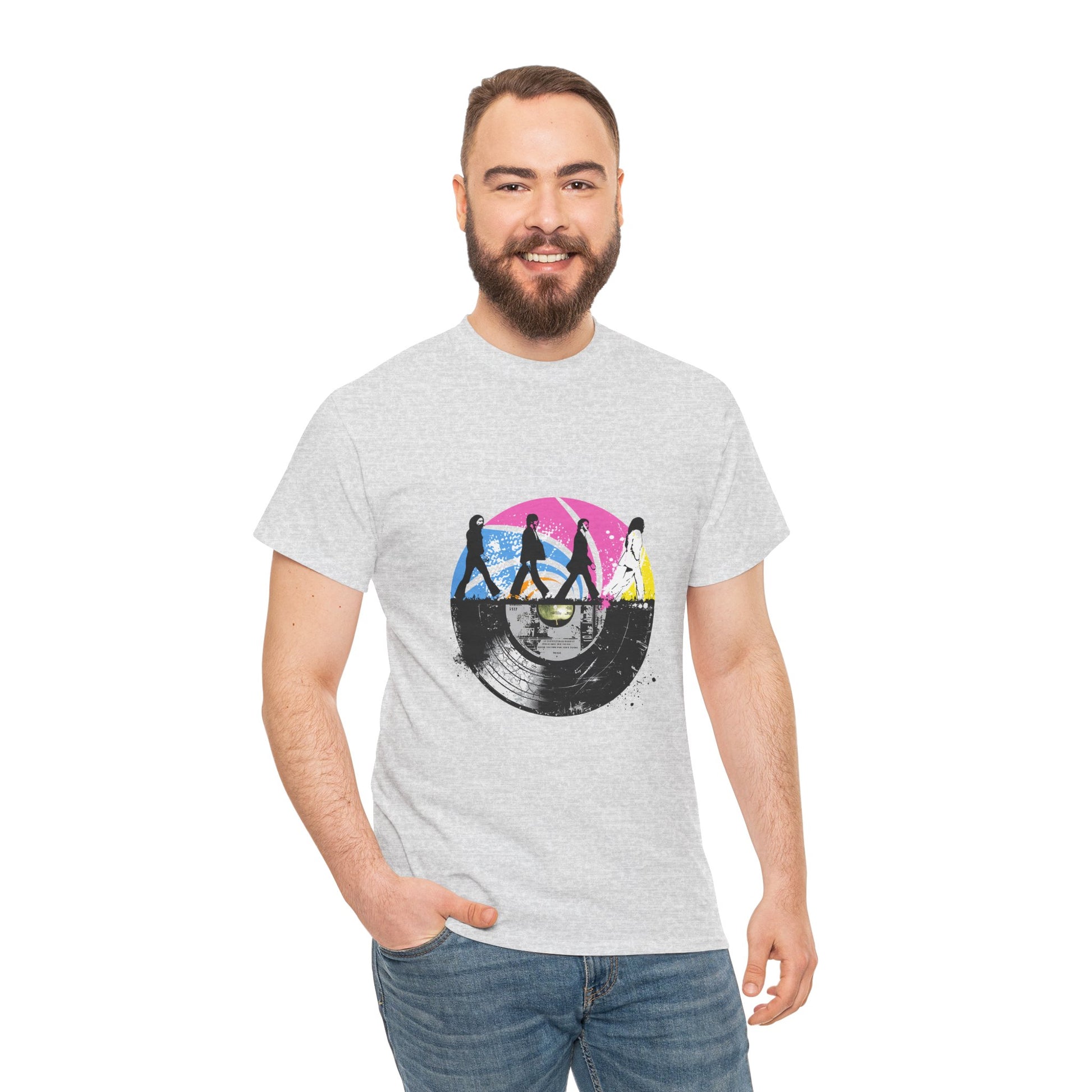 Unisex heavy cotton t-shirt featuring an original Beatles tribute design. This tee blends a classic Abbey Road silhouette with a vibrant vintage vinyl record print, capturing retro rock vibes and timeless nostalgia. Perfect for concerts, casual hangouts, and music-themed events.