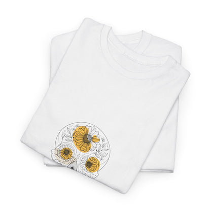 Floral Memento Mori Skull T-Shirt featuring intricate floral details fused with a striking skull design. This unisex heavy cotton tee embodies boho chic style and bohemian charm, making it perfect for casual gatherings, concerts, or everyday wear, and an ideal gift for celebrating individuality.