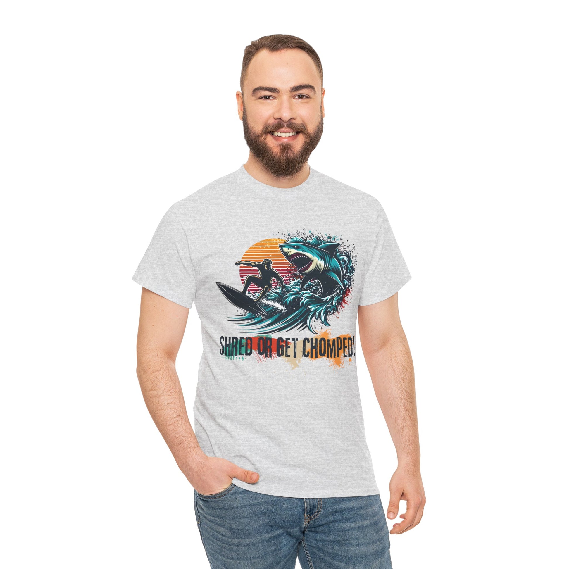 Vintage retro-style Shred or Get Chomped! Surf & Shark T-Shirt, featuring a bold surfer and menacing shark design. Perfect for thrill-seekers, beach lovers, and those who embrace the spirit of summer waves and adventure. Ideal for casual wear, surf shops, and beach outings.