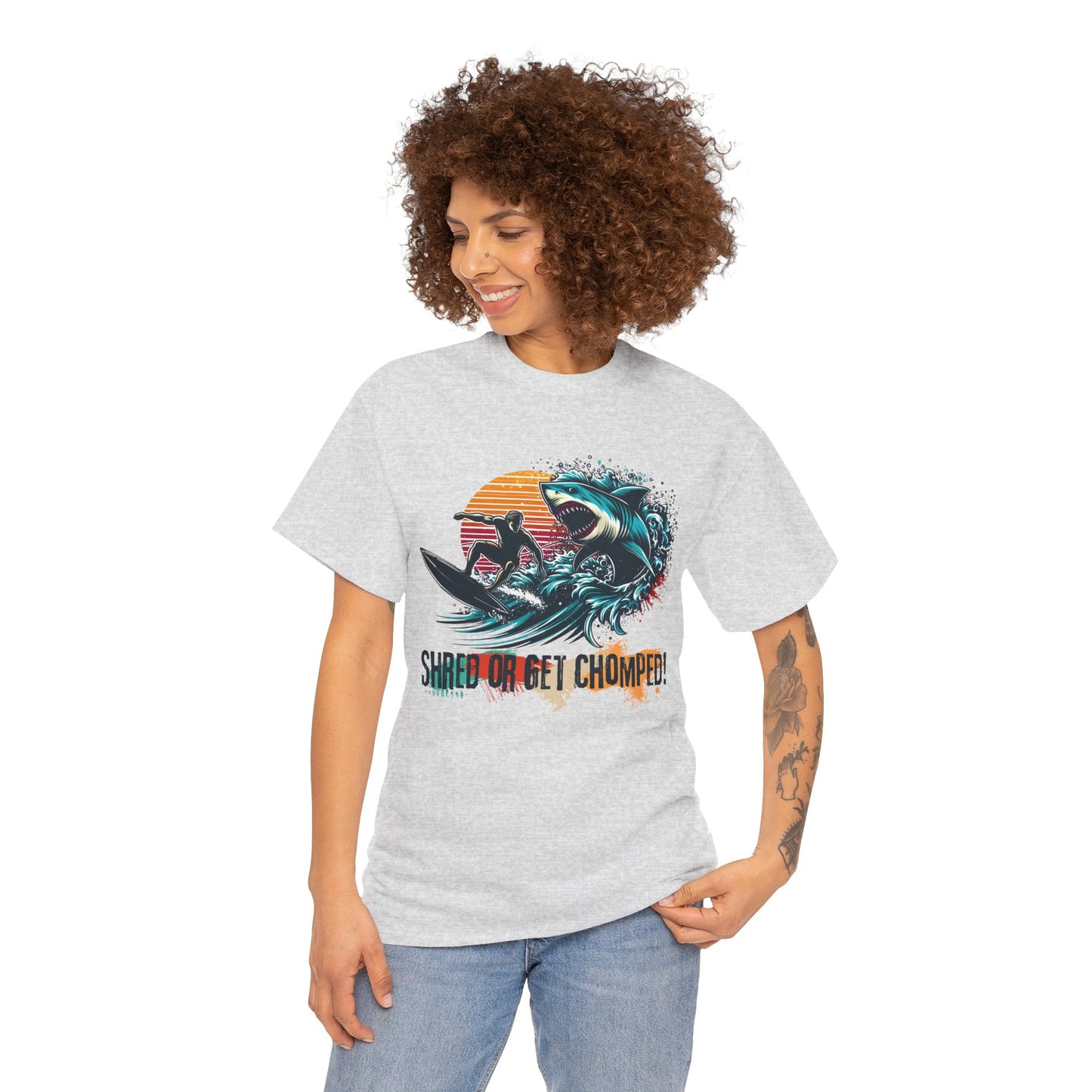 Vintage retro-style Shred or Get Chomped! Surf & Shark T-Shirt, featuring a bold surfer and menacing shark design. Perfect for thrill-seekers, beach lovers, and those who embrace the spirit of summer waves and adventure. Ideal for casual wear, surf shops, and beach outings.